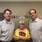 GibsonSingleton Virginia Injury Attorneys partners John Singleton and Ken Gibson present $300 in gas cards to Dutton resident Teresa Chandonnet of Dutton. Chandonnet is the winner of our firm’s drawing following our refrigerator magnet mailing to all Gloucester, Mathews, and Middlesex residents. The magnets contain non-emergency numbers for each county as a quick reference guide. Anyone not receiving a magnet may call us at (804) 413-6777 or come by the office to get one at 4073 George Washington Memorial Highway, Hayes.