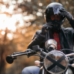 A motorcycle rider wearing a helmet.